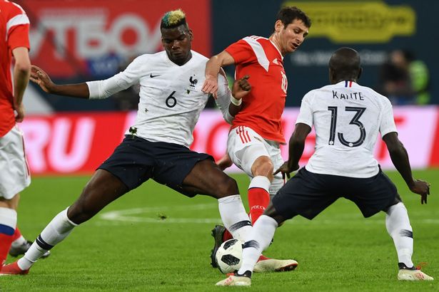 Pogba và Kante trong trận đấu giao hữu với Nga vào tháng Ba.