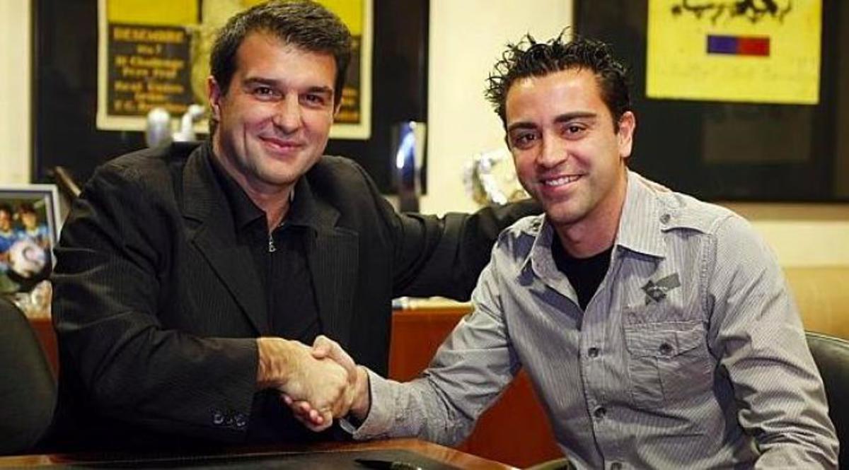 Xavi và Laporta có mối quan hệ tốt.