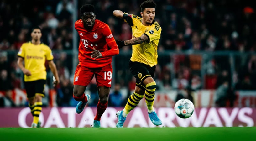 Alphonso Davies và Jadon Sancho thường xuyên chạm mặt nhau vì ở cùng cánh.