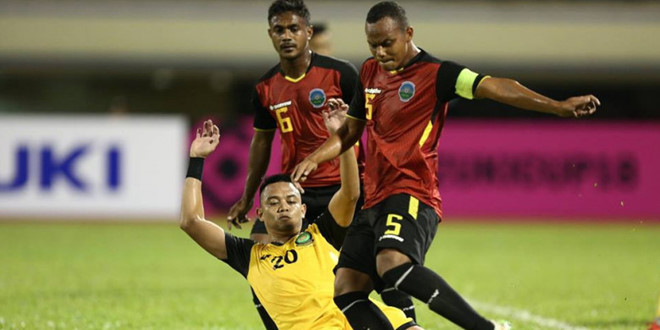 Các cầu thủ Đông Timor (áo đỏ) đánh bại Brunei trong vòng play-off để giành quyền chơi AFF Cup 2018. Ảnh: AFF Cup.