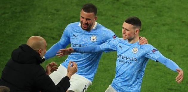 Niềm vui của Guardiola sau bàn thắng quyết định của Foden.