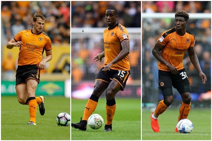 Ryan Bennett (trái) và Willy Boly (giữa) là 2 trong 3 trung vệ đã chơi cực kỳ ổn định ở Premier League năm nay.